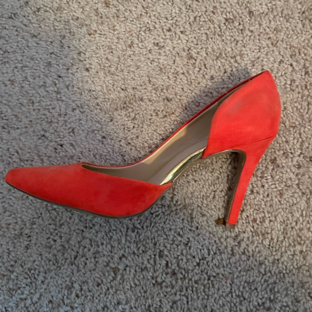 Only worn a couple times. Coral pumps from target